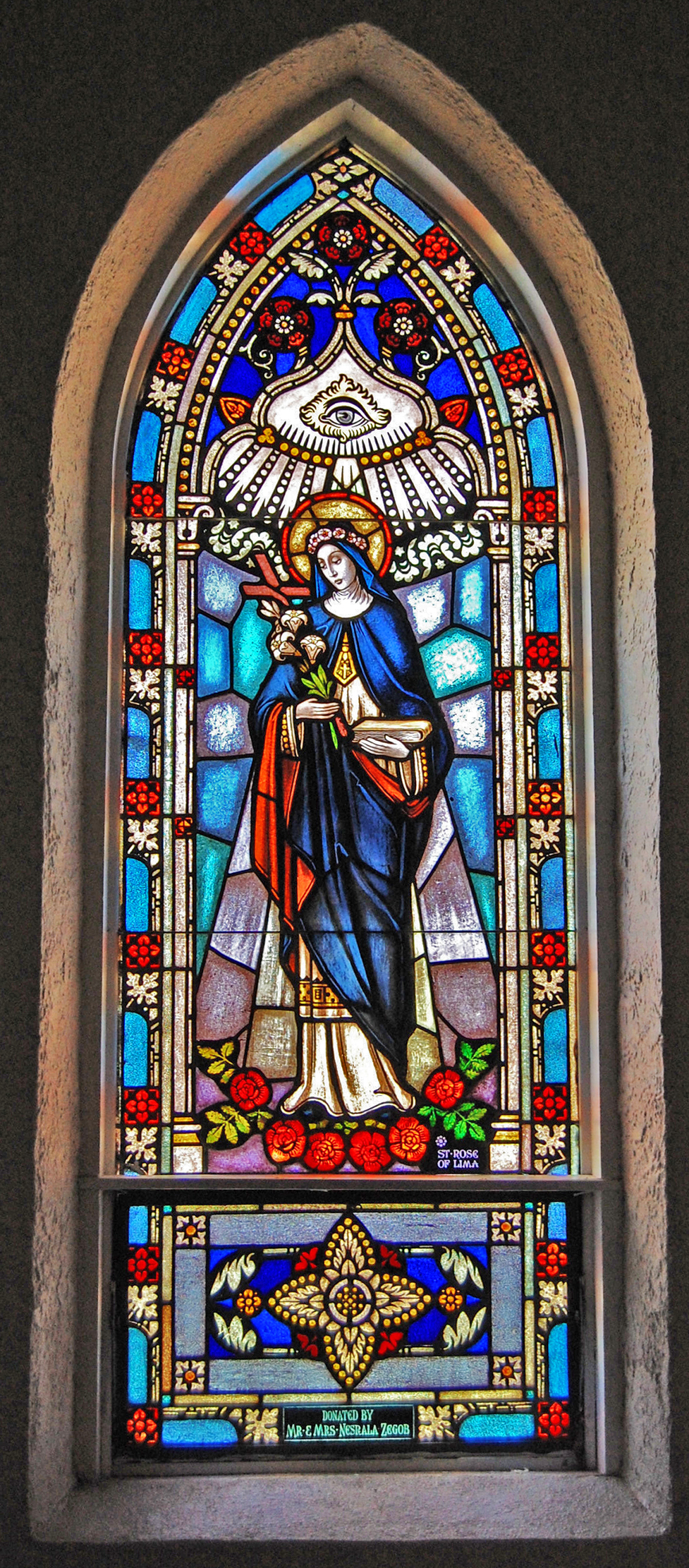 a stained glass window depicting Saint Rose of Lima in the sanctuary of Most Precious Blood Catholic Church in San Luis Colorado on 3 June 2009. The church is now known as Sangre de Cristo.