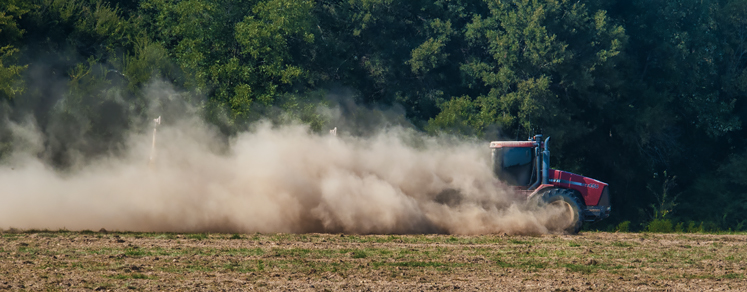 tractor and dust